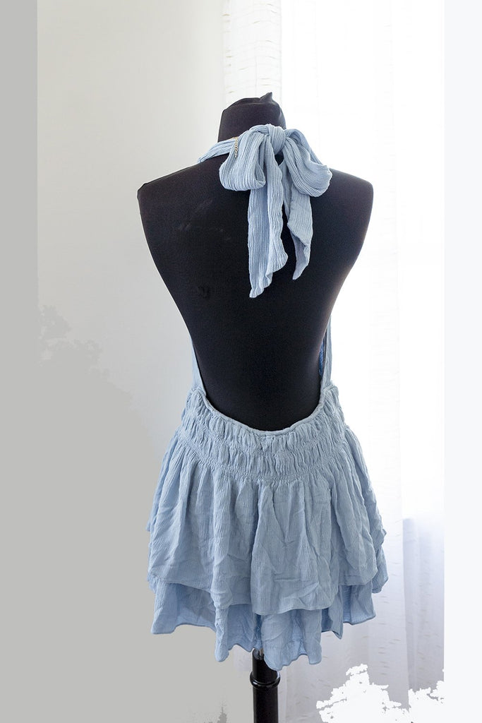 Blue halter romper with two-tier skirt