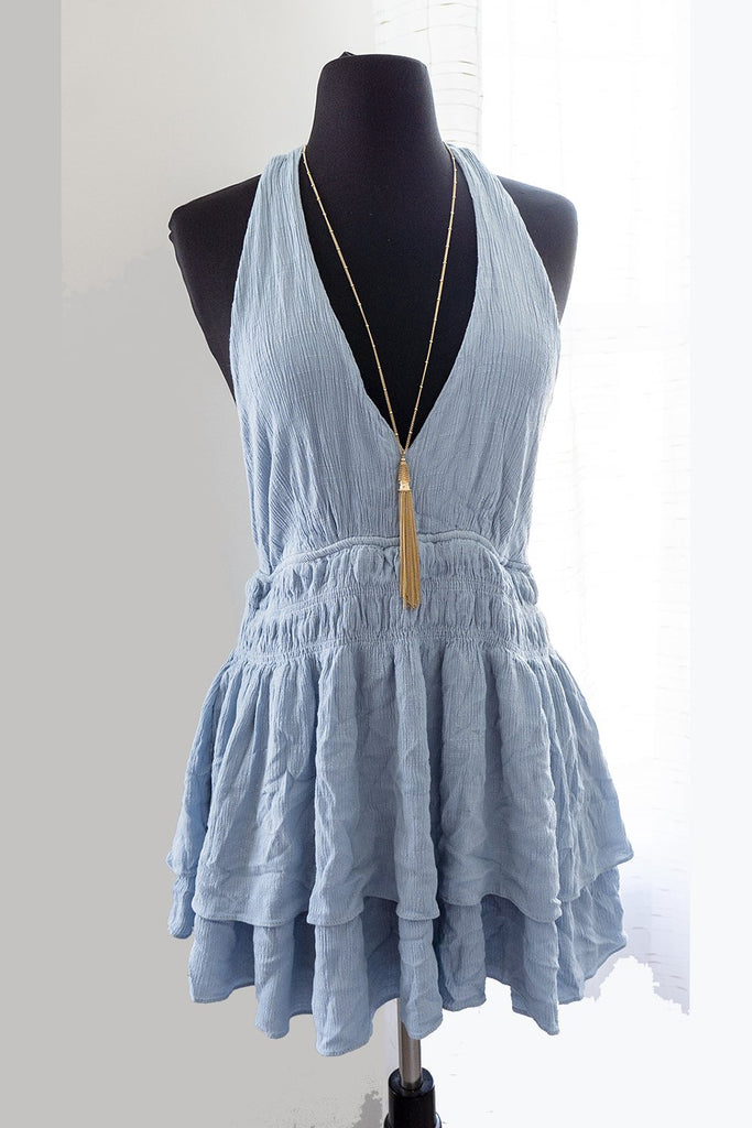 Blue halter romper with two-tier skirt