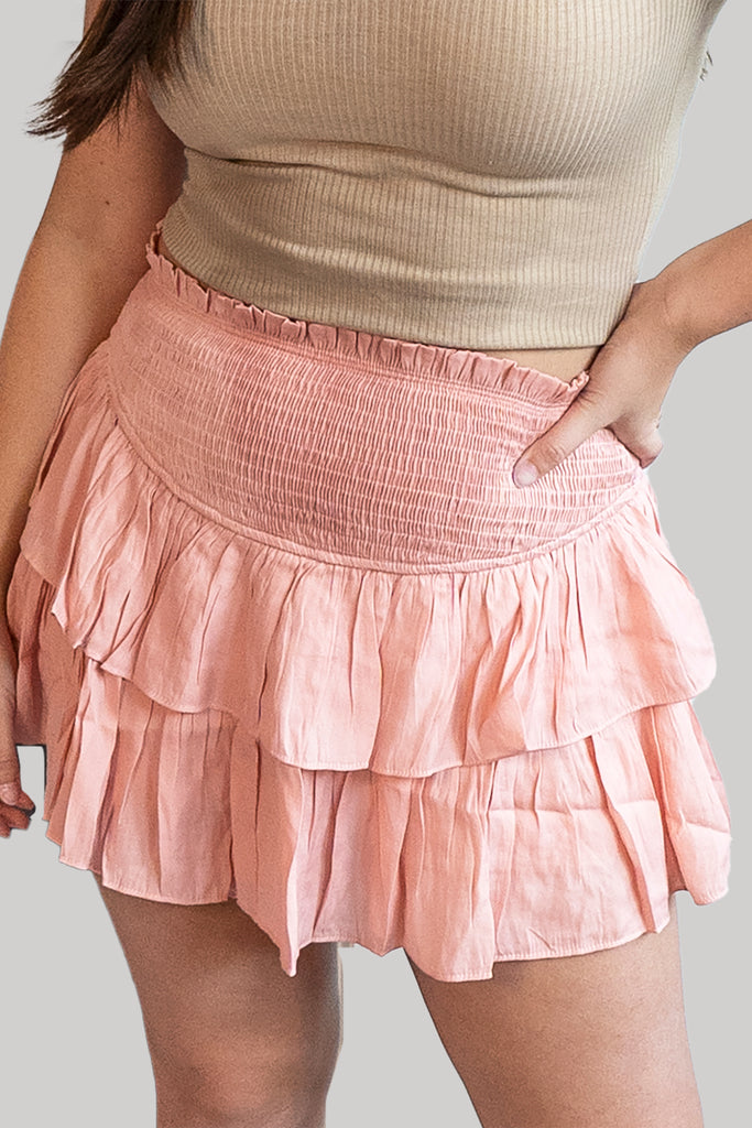 Pink ruffle skirt with shorts underneath