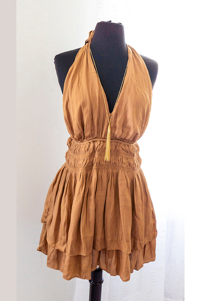 Tan halter romper with two-tier skirt